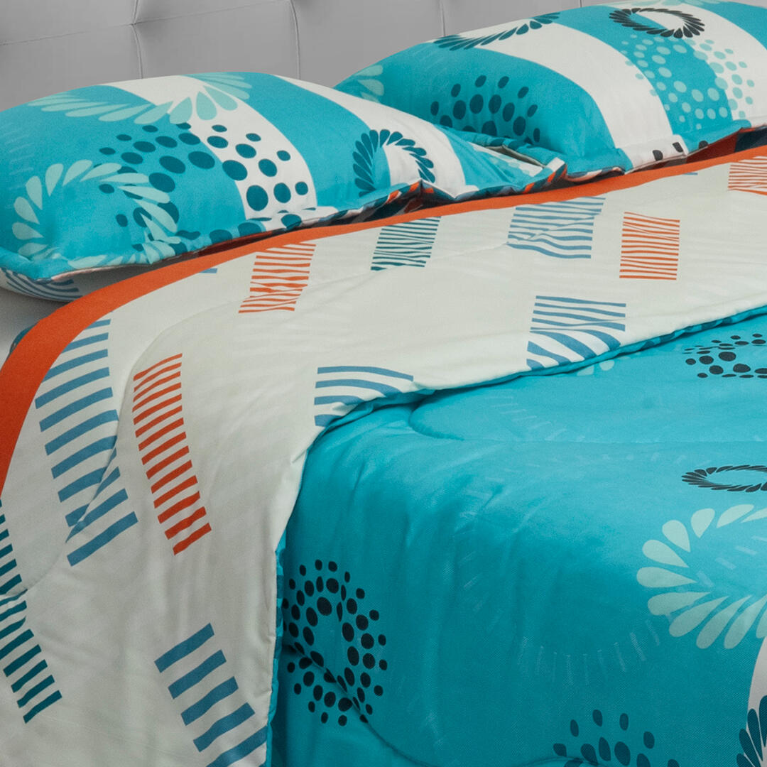 Cubrelecho Semiacolchado Doble Faz Azul Patrón Brisa Tropical Con Líneas Blancas Suavemente Acolchado
